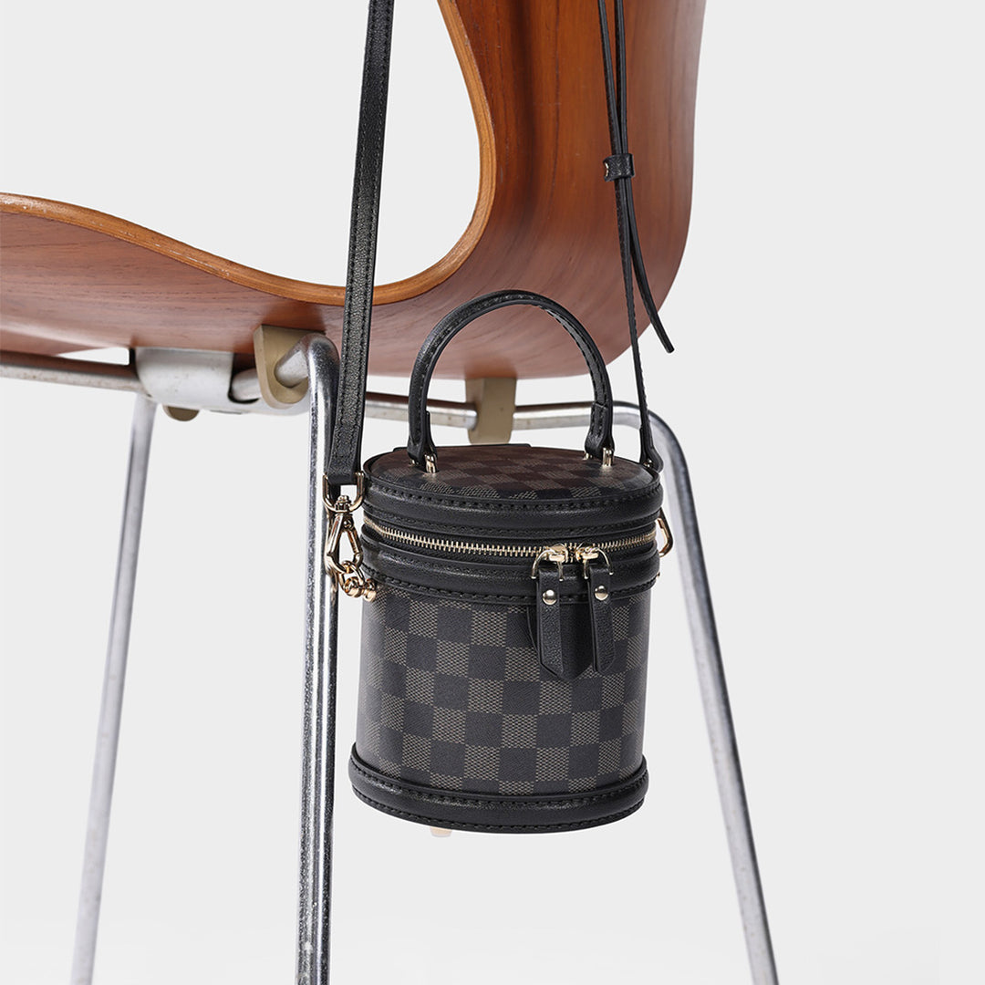 Checkered handbag with gold zippers